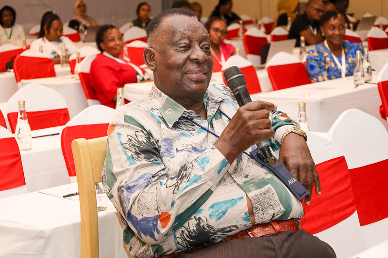 A senior ReSoK member speaks from the floor at a conference