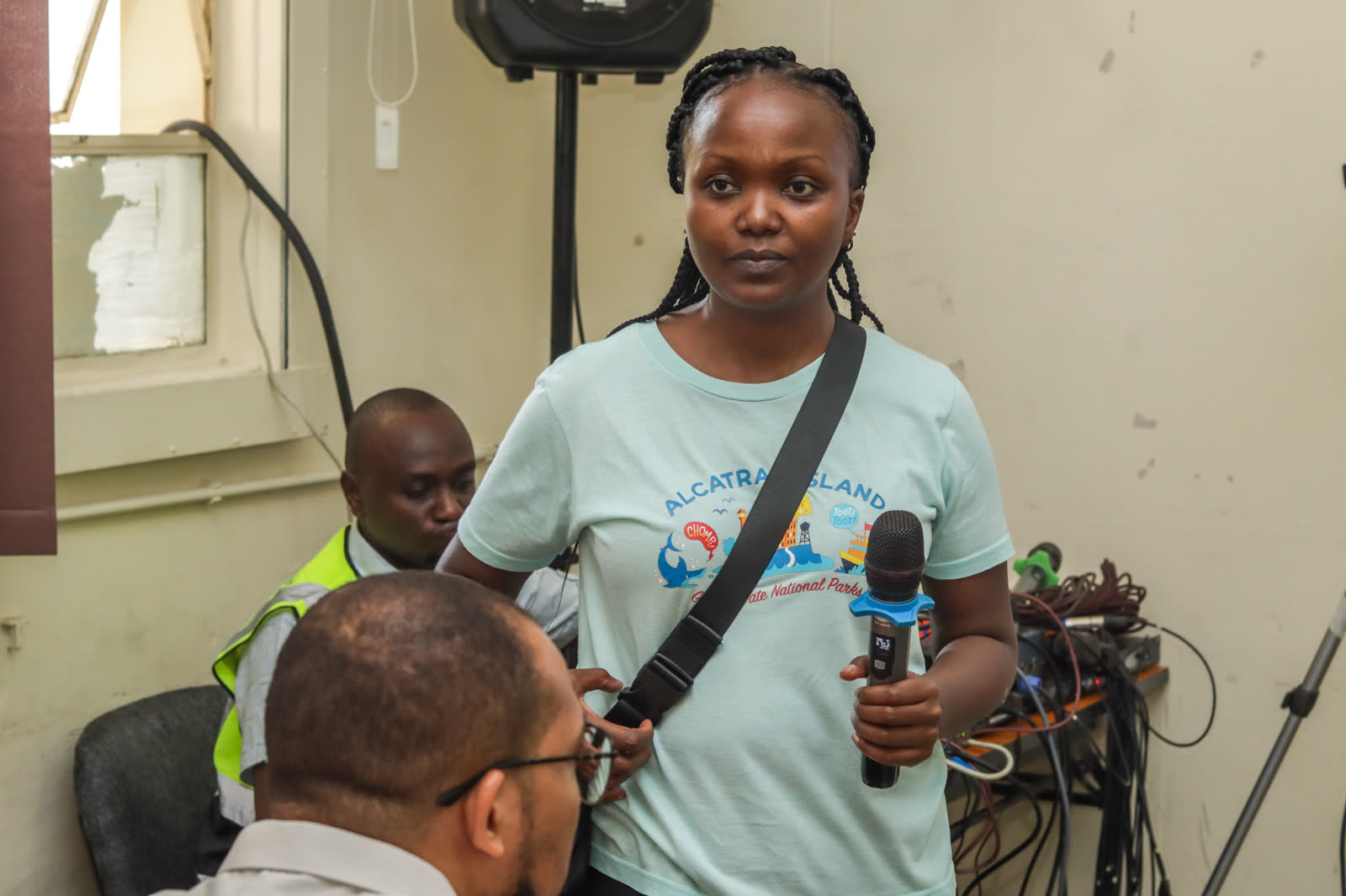 A participant asks a question during an interactive session